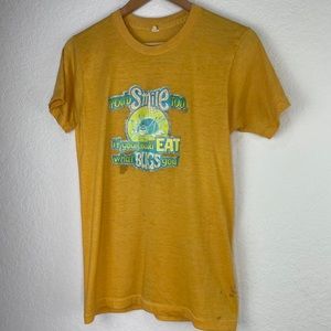 Vintage 70/ 80s βyouβd smile tooβ¦if you could eat what bugs you!β T-shirt